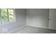 Well-lit bedroom featuring grey walls and carpet at 2145 Boston Ct # B, Indianapolis, IN 46228