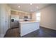 Modern kitchen with stainless steel appliances and island at 1402 Foxtail Ln, Greenwood, IN 46143