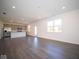 Open kitchen with stainless steel appliances and island at 1402 Foxtail Ln, Greenwood, IN 46143