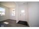 Bright entryway with vinyl plank flooring and access to other rooms at 1402 Foxtail Ln, Greenwood, IN 46143