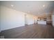 Open living area with kitchen and access to other rooms at 1402 Foxtail Ln, Greenwood, IN 46143