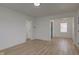 Open living room featuring hardwood floors and an open floor plan at 1517 Wallace Ave, Indianapolis, IN 46201