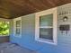 House exterior featuring a light blue porch at 2221 Langley Ave, Indianapolis, IN 46218