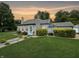 Gray house with landscaping and walkway at 5647 W Mooresville Rd, Indianapolis, IN 46221
