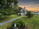 Gray house with landscaping and walkway at 5647 W Mooresville Rd, Indianapolis, IN 46221