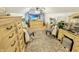 Large bedroom with two dressers and a TV at 5647 W Mooresville Rd, Indianapolis, IN 46221