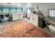 Laundry room with washer, dryer, and ample storage at 5647 W Mooresville Rd, Indianapolis, IN 46221
