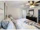 Bedroom with queen-size bed and en-suite bathroom at 5647 W Mooresville Rd, Indianapolis, IN 46221