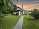 Gray house with walkway and landscaping at 5647 W Mooresville Rd, Indianapolis, IN 46221
