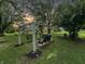 Peaceful backyard with swings and mature trees at 5647 W Mooresville Rd, Indianapolis, IN 46221