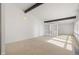 Spacious living room with large windows and built-in shelving at 4120 Ridgeway Ave, Columbus, IN 47203