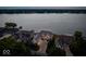 Luxury lakefront home with a large driveway at 9088 Nautical Watch Dr, Indianapolis, IN 46236