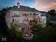 Back of house features a patio, fire pit, and pergola at 9088 Nautical Watch Dr, Indianapolis, IN 46236
