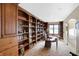 Impressive library with built-in bookshelves and a large desk at 9088 Nautical Watch Dr, Indianapolis, IN 46236