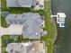 Bird's-eye view of home, showcasing lakefront location and landscaping at 9088 Nautical Watch Dr, Indianapolis, IN 46236