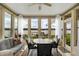 Sunroom with lake views and seating area at 9088 Nautical Watch Dr, Indianapolis, IN 46236