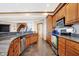 Basement kitchen with curved countertops and stainless steel appliances at 9088 Nautical Watch Dr, Indianapolis, IN 46236