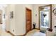 Bright front entry featuring a stained glass door and tiled floor at 9088 Nautical Watch Dr, Indianapolis, IN 46236