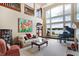 Spacious living room features a grand piano, large windows, and high ceilings at 9088 Nautical Watch Dr, Indianapolis, IN 46236