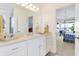 Bathroom with white vanity and shower at 9088 Nautical Watch Dr, Indianapolis, IN 46236