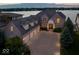 Lakefront property with large brick house and 3-car garage at 9088 Nautical Watch Dr, Indianapolis, IN 46236