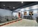 Finished basement home theater with seating and shelving at 9088 Nautical Watch Dr, Indianapolis, IN 46236