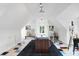 Bright, spacious art studio with sloped ceilings and colorful floors at 9088 Nautical Watch Dr, Indianapolis, IN 46236