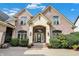 Brick home with a two-story entryway and manicured landscaping at 9088 Nautical Watch Dr, Indianapolis, IN 46236