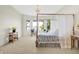 Charming bedroom with four-poster bed and lake view at 9088 Nautical Watch Dr, Indianapolis, IN 46236
