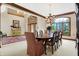 Elegant dining room with chandelier and hardwood floors at 9088 Nautical Watch Dr, Indianapolis, IN 46236
