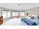 Lake view bedroom with a queen-size bed and calming decor at 9088 Nautical Watch Dr, Indianapolis, IN 46236