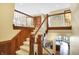 Elegant wooden staircase connecting the home's floors at 9088 Nautical Watch Dr, Indianapolis, IN 46236
