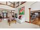 Open living room with views into the kitchen and hardwood floors at 9088 Nautical Watch Dr, Indianapolis, IN 46236