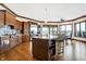 Spacious kitchen with an island, hardwood floors, and a breakfast nook at 9088 Nautical Watch Dr, Indianapolis, IN 46236
