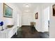 Bright entryway with dark tile floors and white walls at 9088 Nautical Watch Dr, Indianapolis, IN 46236