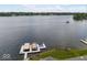 Peaceful lake view with houses in the background at 9088 Nautical Watch Dr, Indianapolis, IN 46236