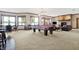 Basement game room with pool table, fireplace, and comfortable seating at 9088 Nautical Watch Dr, Indianapolis, IN 46236