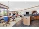Open concept basement rec room with wet bar and game tables at 9088 Nautical Watch Dr, Indianapolis, IN 46236