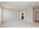 Main bedroom with carpeted floors and an ensuite bathroom at 7123 Bailow Ct, McCordsville, IN 46055