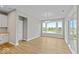 Bright dining area with hardwood floors and sliding glass doors leading to a patio at 7202 Bailow Ct, McCordsville, IN 46055