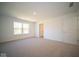 Bright bedroom with neutral carpet and access to bathroom at 1678 Orchard Dr, Fortville, IN 46040