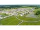 Large community with multiple ponds and homes at 1678 Orchard Dr, Fortville, IN 46040