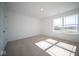 Spacious bedroom with large window and closet at 1678 Orchard Dr, Fortville, IN 46040