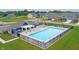 Community pool with surrounding patio at 1678 Orchard Dr, Fortville, IN 46040