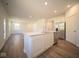 Modern kitchen with stainless steel appliances and an open floor plan at 1678 Orchard Dr, Fortville, IN 46040