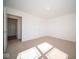 Bright bedroom with carpet and access to hallway at 1678 Orchard Dr, Fortville, IN 46040