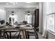 Farmhouse dining room with wooden table and seating for six at 8816 Blue Marlin Dr, Indianapolis, IN 46239