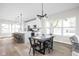 Modern kitchen with island, stainless steel appliances, and hardwood floors at 1643 Sheldon St, Indianapolis, IN 46218