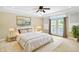 Spacious primary bedroom with plush carpet and access to private balcony at 2150 Washington St, Columbus, IN 47201