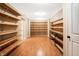 Finished basement with wood shelving for storage at 2150 Washington St, Columbus, IN 47201
